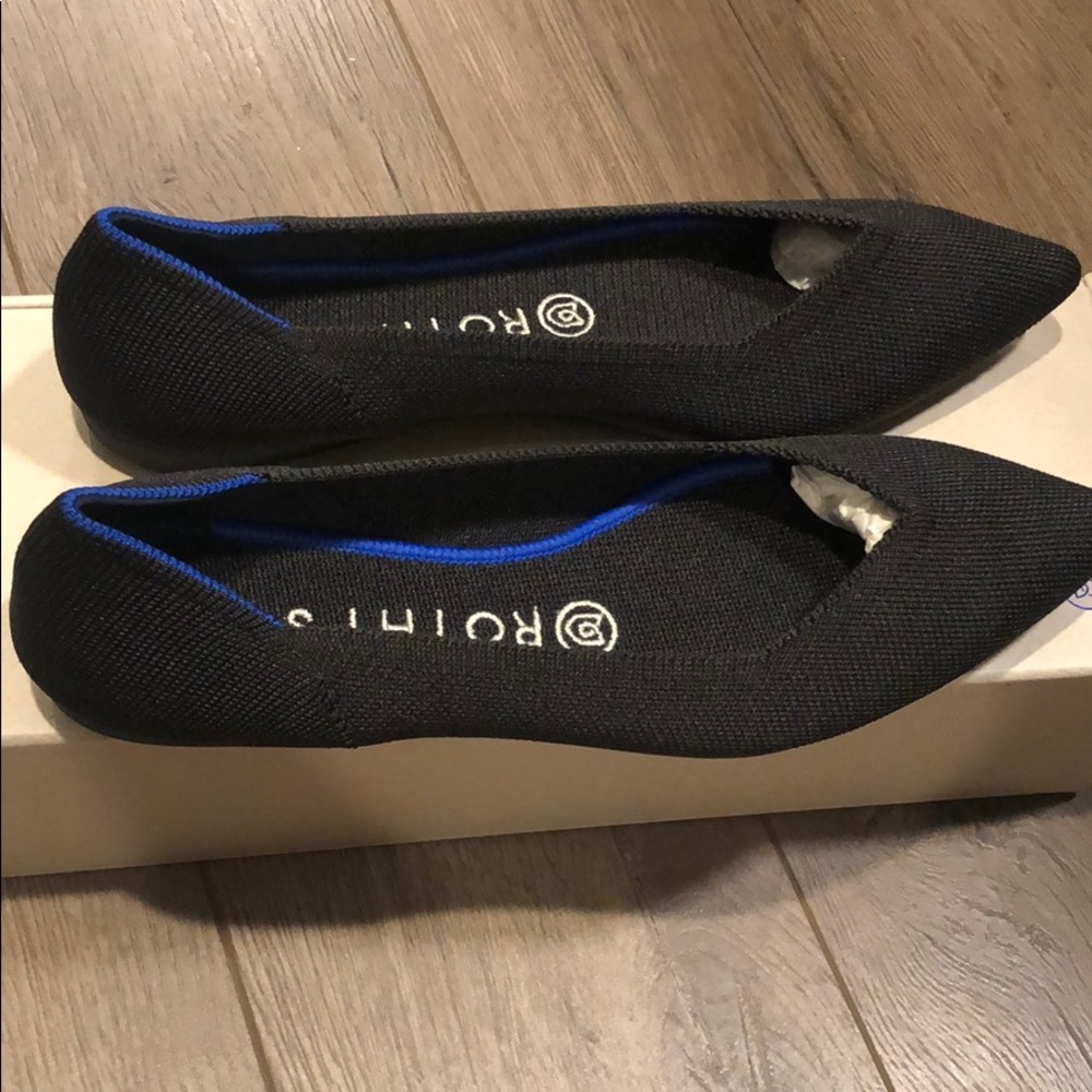 Rothy’s “The Point” black solid flats.